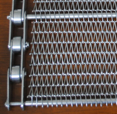 Niestandardowy żaroodporny ciągły spożywczy ze stali nierdzewnej ss304 Metalowa taśma przenośnikowa z siatki spiralnej do pieców do pizzy i ciastek